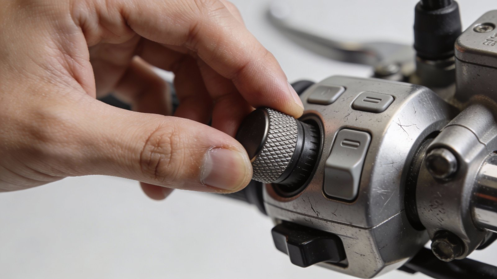 **Professional shot of a hand adjusting brake controller settings**