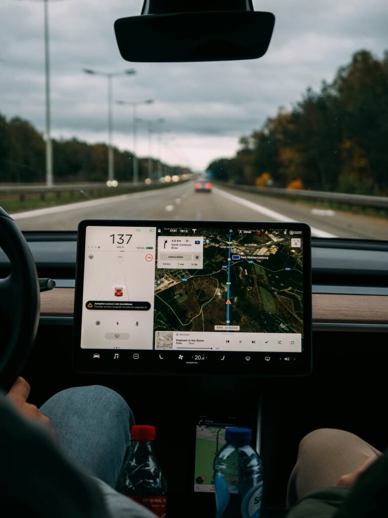 Truck dashboard GPS showing a route on the highway